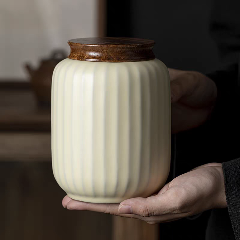 vertical stripes on a cylinder  Hand-made ceramic pet cremated urn at high temperature