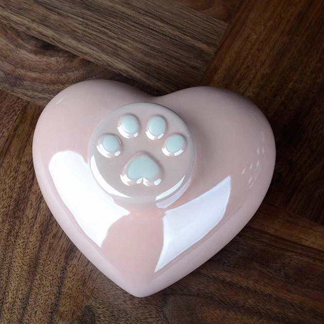 Paw print
Ceramic heart-shaped pink pet urn