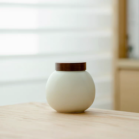 Cream-yellow glazed cork lid urn